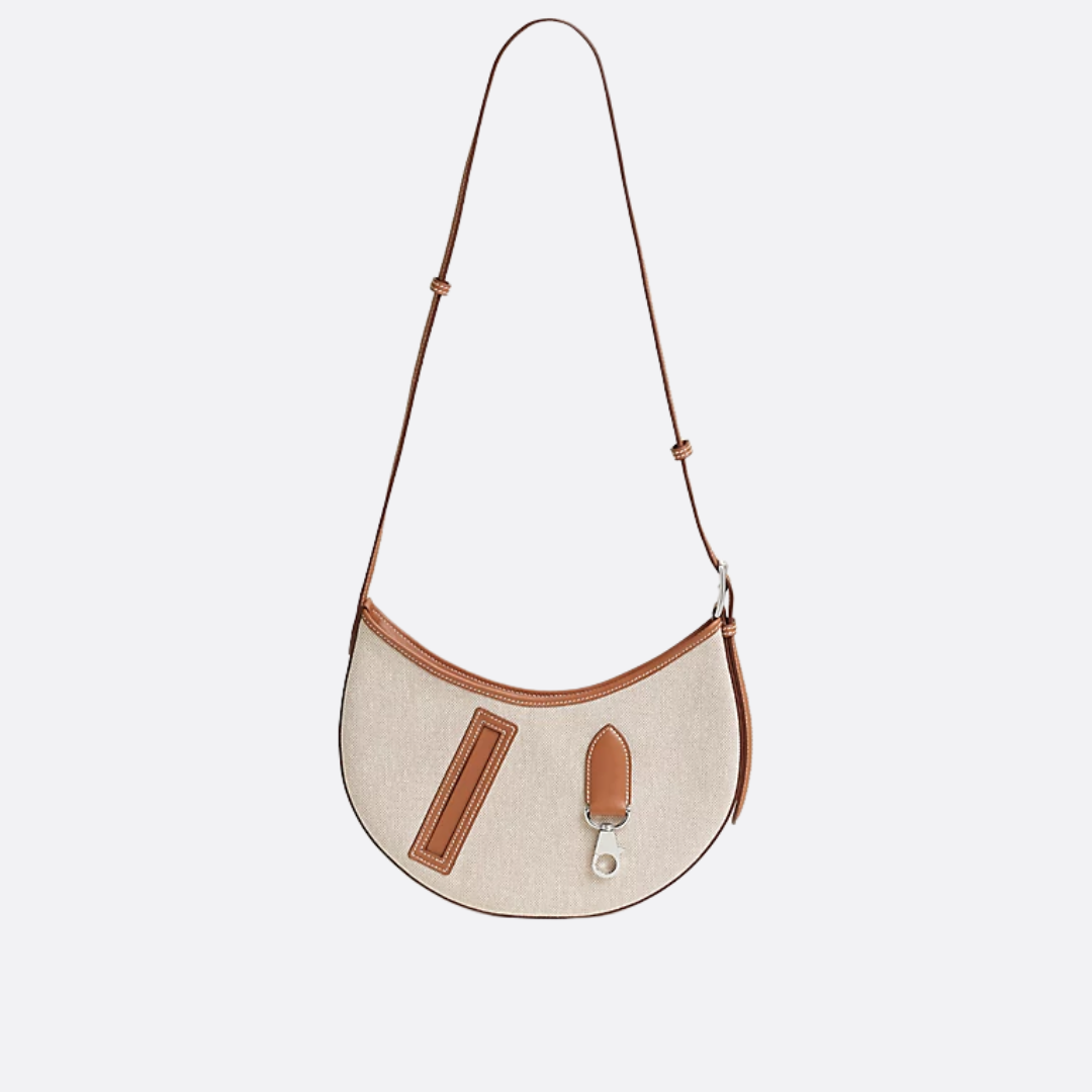 P’TIT ARÇON BAG IN CANVAS & LEATHER HERMÈS