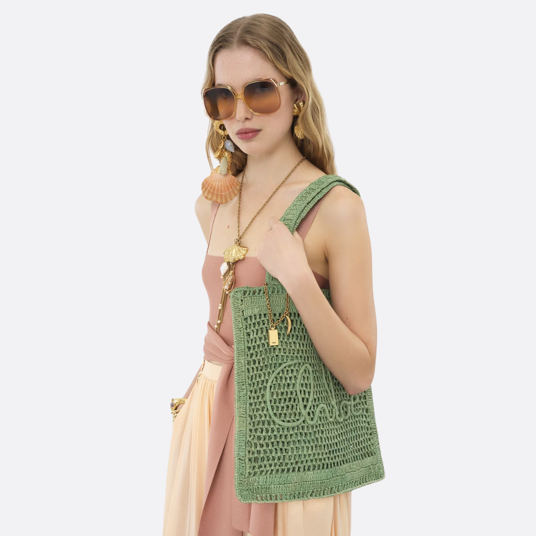 CHLOÉ SUMMER BANANA BAG IN RAFFIA